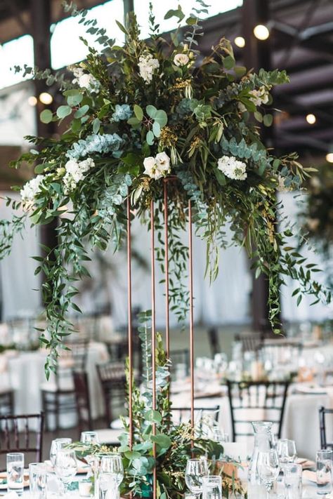 Greenery Wedding Arrangements, Wedding Flower Arrangements Greenery, Industrial Boho Wedding Centerpieces, Column Vase Centerpiece, Greenery Tall Centerpiece Wedding, Heavy Greenery Centerpiece, Tall Centerpieces Wedding Table Decor, Rustic Tall Centerpieces Wedding, Romantic Greenery Wedding Decor