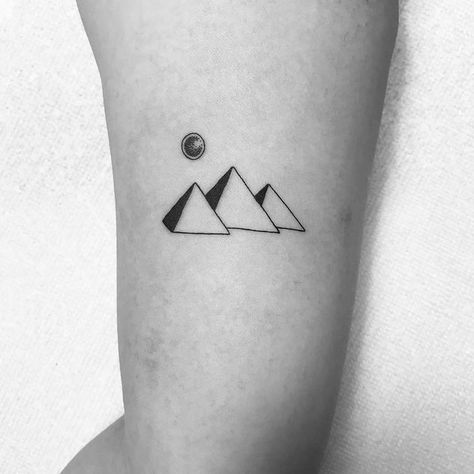 Minimalist Pyramids of Giza Tattoo by laylachenyz Tattoo Ideas Minimal, Pyramid Tattoo, Faith Tattoo On Wrist, Minimalist Tattoo Meaning, Paris Tattoo, Typography Tattoo, French Tattoo, Egypt Tattoo, Back Of Shoulder Tattoo