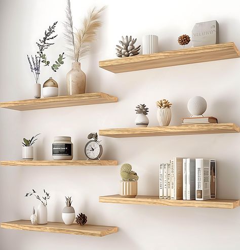 PRICES MAY VARY. Real Wood Floating Shelves: Crafted from solid wood for a durable and sturdy design. PHPH wood floating shelves with natural wood grain give a rustic feel to any space. Modern Rustic floating shelves: PHPH modern rustic floating shelves provide a industrial look that will blend well with modern and farmhouse wall decor alike. You are sure to make a welcome addition and a warm touch to your bathroom, kitchen, bedroom, or living room. Display Decor Floating Shelves: The rustic flo Rustic White Shelves, Wall Shelves Design Dining Room, Kitchen Wall Design Ideas Decor, Floating Shelves On Big Wall, Multiple Floating Shelves On Wall, Gold Floating Shelves Kitchen, Floating Shelves Dining Room Wall Decor, Shelving For Bedroom Wall, Simple Shelves Ideas