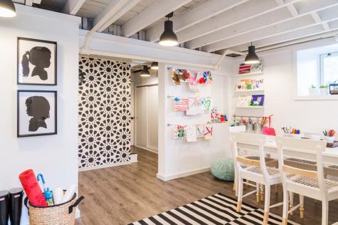 Craft Room Ideas to Copy at Home | HGTV Stockholm Rug, Contemporary Laundry, Unfinished Basement Ceiling, Finished Basement Designs, Low Ceiling Basement, Ikea Stockholm, Wrapping Station, Basement Living, Basement Playroom