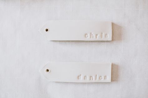 CREATIVE GIFT WRAPPING WITH DIY CLAY NAME TAGS | Nadine Stay Diy Name Tags For Gifts, Clay Name Tags Weddings, Clay Name Tags, Nadine Stay, Diy Name Tags, Holiday Art Prints, Clay Gift Tags, Diy Stockings, Old Vases