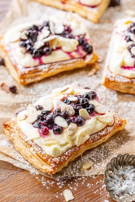 Puff Pastry is the perfect base to these 12 delicious puff pastry tart recipes. These sweet, fruit filled desserts can all be made with store-bought puff pastry. No Flour Dessert Recipes, Lemon Puff Pastry Recipes, Easter Pastries, Puff Pastry Tarts, Using Puff Pastry, Kue Macaroon, Puff Pastry Desserts, Puff Pastry Tart, Pie Pops