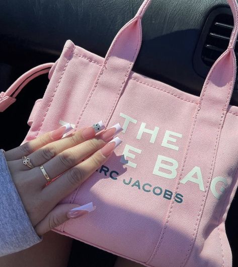 Pink tote bag to carry all the daily necessities such as lipstick, lipgloss, sunglasses snd glamour. Pink Tote Bag Marc Jacobs, Small Marc Jacobs Tote Bag, The Tote Bag Marc Jacobs Aesthetic, Pink Marc Jacobs Tote Bag, Mark Jacobs Bag, Aesthetic 2025, Marc Jacobs Tote Bag, The Namesake, Pink Tote Bag