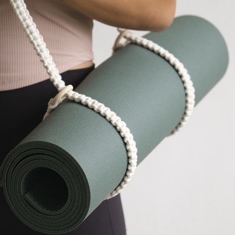 From yoga mats to picnic blankets, or even your camera stand – our hand-knotted macrame strap is the stylish, all-purpose carrier you didn’t know you needed! Make it uniquely yours or a thoughtful gift – personalize with a leather name deboss tag. #fegome #matcarrier #macrameyogastrap #macramé #customisegifts #yogakl Macrame Yoga Mat Strap Diy, Macrame Mat, Macrame Strap, Yoga Mat Strap, Camera Stand, Yoga Strap, Picnic Blankets, Yoga Accessories, Yoga Mats