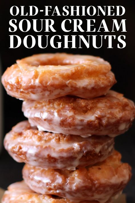 Homemade Old-Fashioned Sour Cream Doughnuts are coated in glaze and taste just like the cakey ones at your favorite bakery! No yeast makes this fried recipe simple. #oldfashioneddonut #sourcreamdoughnut Cake Donuts Baked Old Fashioned, Krispy Kreme Donuts Recipe Cream Filled, Sour Cream Donuts Old Fashioned, Buttermilk Donuts Old Fashioned, Donut Recipes Easy, Long John Donut Recipe, Cake Donuts Fried, Baked Sour Cream Donut Recipe, Cruller Donut Recipe