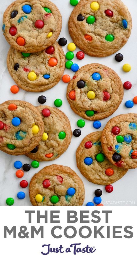 A top-down view of M&M cookies studded with a rainbow of M&M's. Soft Batch M&m Cookies, Recipe For M&m Cookies, Perfect M&m Cookies, Best M&m Cookies, How To Make M&m Cookies, Mini Mnm Cookies Recipe, M&m Cookie Dough, Best M&m Cookies Ever, Homemade M&m Cookie Recipe