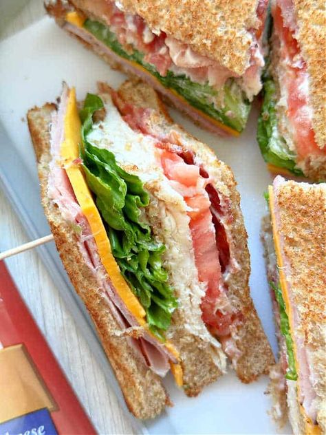 Sour Dough Bread Sandwiches, Club Sandwich Photography, Sandwich Ideas Party, Hand Sandwiches, Tarragon Mayonnaise, Sandwich Business, Cranberry Turkey Sandwich, Club Sandwich Ingredients, Buttery Toast