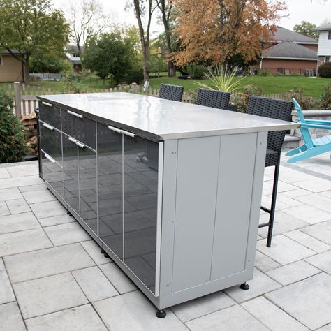 Guess what's back? OUTDOOR KITCHENS!  Tap to shop to give your outdoor space a nice refresh to host outdoor gatherings this summer and fall.  #blueskyoutdooorliving #outdoorliving #patio #outdoorkitchen #outdoors #hosting #patioreno #kitchens #kitchenaccessories #cabinets #organization Kitchen Island Frame, Outdoor Kitchen Cabinet, Top Kitchen Cabinets, Modular Outdoor Kitchens, Cabinet Top, Outdoor Kitchen Cabinets, Stainless Steel Counters, Outdoor Sinks, Outdoor Kitchen Island