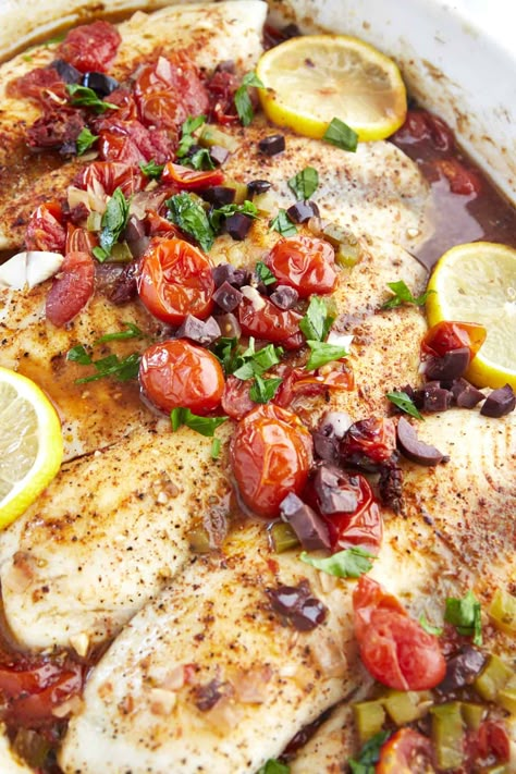 Prepare this easy baked Mediterranean tilapia recipe in less than an hour for a flavor-loaded, nutrient-rich dinner! Mediterranean Tilapia, Easy Tilapia, Tilapia Dinner, Oven Baked Tilapia, Tilapia Recipes Easy, Fresh Fish Recipes, Baked Tilapia Recipes, Tilapia Recipe, Baked Tilapia