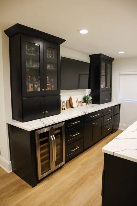 Built In Bar And Tv Cabinet, Bar Tv Wall Ideas, Basement Bar Storage, Black Cabinets In Basement, Dry Bar With Tv Above, Basement Bar On Wall, Basement Bar And Lounge, Tv Over Wet Bar, Galley Bar Basement