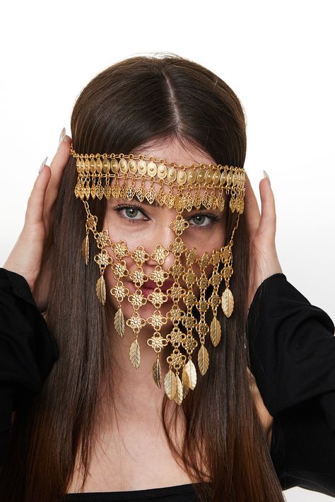 Dive into the world of bohemian luxury with this stunning gold-plated brass face veil. A true statement piece, this headpiece is adorned with intricate leaf patterns and filigree details that define sophistication. Perfect for that ethereal look at festivals, weddings, or any event where you want to stand out. It's not just jewelry; it's a wearable piece of art that transforms your outfit into something magical. Tap to shop this one-of-a-kind piece or save it for your next big event inspiration! Boho Headpiece, Face Veil, Hair Jewellery, Filigree Pattern, Event Inspiration, Leaf Design, Hair Jewelry, Things To Buy, Headpiece