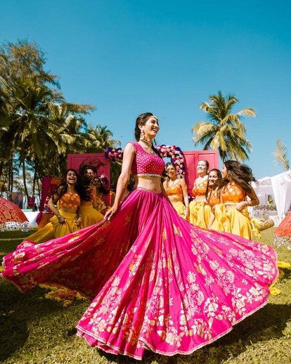 Magenta pink is one such classic color that never goes out of style !! #pink #mehndi #lehenga #bridal #indianbride #Indianweddings #modern #latest Fusia Pink Lehenga Bridal, Haldi Ceremony Pink Outfit, Bright Pink Lehenga, Pink Lehenga For Haldi, Pink Saree For Haldi, Pink Haldi Outfit For Bride, Pink Mehndi Outfit, Pink Haldi Outfit, Magenta Pink Lehenga