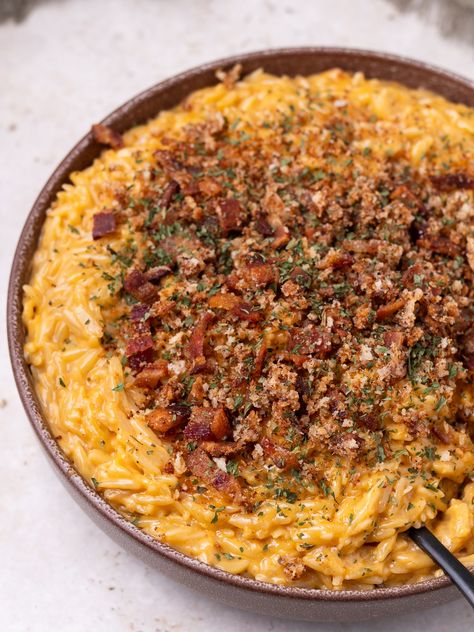 Super Cheesy Orzo Mac and Cheese with Bacon Breadcrumbs Orzo And Cheese, Orzo Mac And Cheese, Bacon Orzo, Pasta With Bacon, Goat Cheese Orzo Pasta, Mac And Cheese With Peas And Bacon, Orzo Dinner Recipes, Orzo Recipes Side, Pork Side Dishes