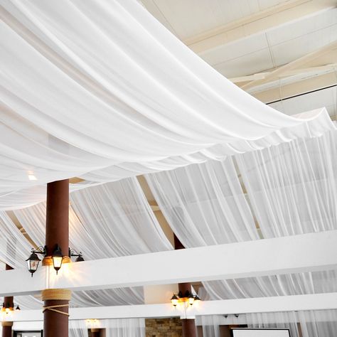 Bring some decor magic to your special day with the ethereal enchantment of CV Linens' Flame Retardant Sheer Voile 40ft Ceiling Draping (FR) in White. Ceiling Drapery, Ceiling Drapes, Ceiling Draping, Fabric Draping, Ceiling Curtains, Long Drapes, White Drapes, Ceiling Treatments, Pipe And Drape