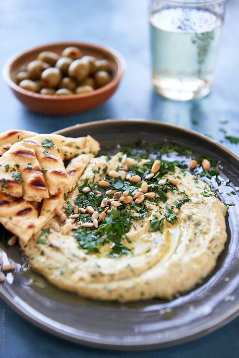 Herb Hummus Starter With Pita Bread And Olives | Stocksy United Hummus And Pita Platter, Hummus And Pita Aesthetic, Pita Bread With Hummus, Pitta Bread And Hummus, Hummus With Pita Bread, Hummus And Pita Chips, Pita Bread Photography, Hummus And Bread, Hummus And Crackers Aesthetic