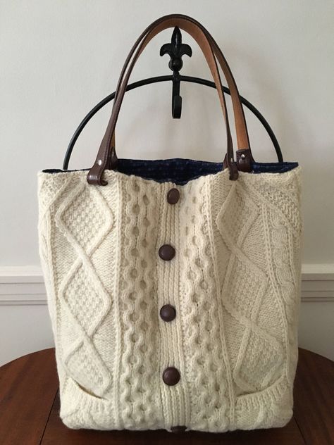 Irish Aran Knit Felted Wool Tote Bag by FilzWork on Etsy https://www.etsy.com/listing/524365091/irish-aran-knit-felted-wool-tote-bag Old Sweater Crafts, Wool Tote Bag, Aran Knit, Felt Tote Bag, Wool Tote, Felt Tote, Sweater Bags, Upcycled Bag, Knitted Bag