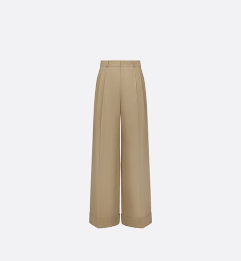 The wide-leg, flared pants are a hallmark silhouette of the season. Crafted in beige cotton gabardine, they feature dart detailing, a lengthwise pleat and a cuffed hem adding structure. Completed by practical side and rear pockets, the pants may be paired with a blouse from the collection for a contemporary look.. 34 Denim Swimsuit, Dior Star, Icon Shoes, Stole Scarf, Short Denim, Short T Shirt, Airport Fashion, Tshirt Skirt, Pantalon Large