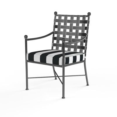 Elevate your outdoor dining experience with this wrought iron patio chair, designed to bring timeless elegance to your al fresco gatherings. The chair features a comfortable foam-filled Sunbrella cushion, crafted from 100% solution-dyed acrylic, ensuring year-round use. With removable cushion covers, maintenance is a breeze – simply untie and wash as needed. The chair's non-swivel and non-foldable design offers a classic touch to your patio, while the metal legs provide a solid foundation. Enjoy Wrought Iron Patio Chairs, Dining Armchair, Outdoor Bar Stools, Sunbrella Cushions, Outdoor Cover, Patio Dining Chairs, Chair Types, Outdoor Hanging Lights, Small Patio