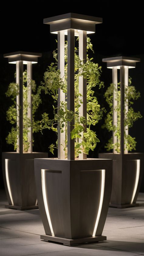 Explore elegant tall outdoor planter ideas that add sophistication to any garden or patio. Get inspired with designs that suit every style. Diy Black Planter, Planter Pot Ideas Outdoor, Outdoor Planters Ideas, Outdoor Planter Ideas, Vertikal Garden, Planters Ideas, Metal Planter Boxes, Patio Planters, Tall Planters