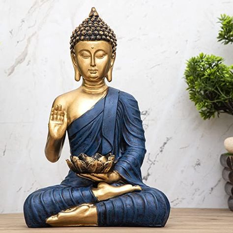 Material: Polystone
Size (L x W x H): 15 cm x 10 cm x 26 cm: Weight : 300 gm
Colour: Blue Golden
Care Instruction: Wipe with soft clean cloth
Made In India Buddha Statue Home, Buddha Idol, House Warming Ceremony, Meditation Decor, Antique Gifts, Marriage Couple, Sitting Buddha, Lord Buddha, Buddha Meditation