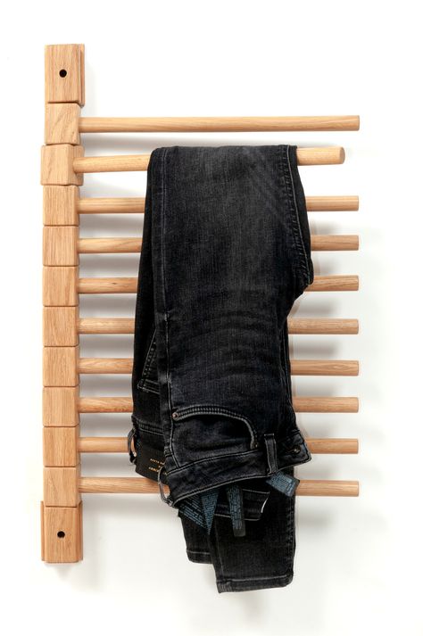 "This trouser rack, crafted to perfection, will be the perfect solution to all your organisational problems. If you have a wardrobe that is desperately lacking in space, or if you simply want a more efficient way to display your trousers, this solid oak trouser rack is the perfect solution.

Designed to save you time and space, this trouser organiser easily attaches to any wall or cupboard door, offering you the flexibility to position your trousers to suit your needs." Small Clothes Dryer, Wall Mounted Clothes Dryer, Trouser Rack, Wardrobe Dimensions, Handy Gadgets, Wall Mounted Drying Rack, Kitchen Wrap, Rack Clothes, Pants Rack