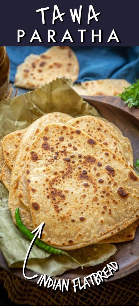 Plain Paratha or Tawa Paratha is an Indian flatbread made using whole wheat flour. It’s prepared in a lot of households almost on a daily basis. Here is how to make it. Plain Paratha, Indian Lunch Box, Indian Bread Recipes, Indian Flatbread, Paratha Recipe, Arroz Frito, Paratha Recipes, Indian Bread, Oil And Water