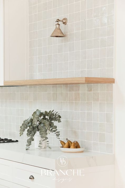 Warm grey square tiled backsplash in kitchen with timber shelf and marble look counter. Interior Design by Branche Designs. Square Tile Backsplash, Kitchen Wall Tiles Design, Open Kitchen Cabinets, White Kitchen Splashback, Kitchen Splashback Tiles, Simple Bathroom Designs, Timber Kitchen, Timber Shelves, White Kitchen Tiles