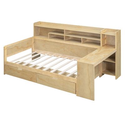 This bed frame, with its unique design concept and exquisite craftsmanship, easily creates a sense of fashionable atmosphere. The cleverly thought-out design can't help but attract people's eyes. The frame structure of the bed frame is stable and solid, and the selection of high-quality materials is carefully crafted to ensure that it can withstand various pressures and weights in the process of use, maintaining long-term stability and durability. Color: Natural | George Oliver Wooden Size Daybed w / Storage Shelves, Multi-Functional Bed w / Two Storage Drawers & Study Desk brownWood in Natural | Twin | Wayfair Boys Bed With Storage, Twin Bed Frame Ideas For Small Room, Diy Bed With Drawers, Beds With Shelves, Bed Shelving, Twin Daybed With Storage, Functional Bed, Desk Antique, Twin Size Daybed