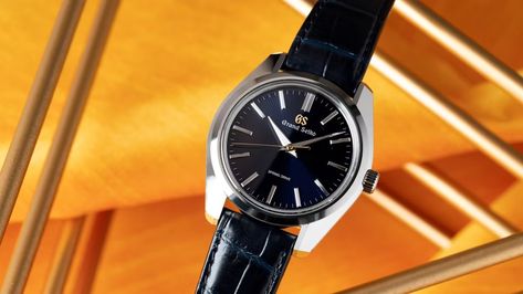 The Grand Seiko SBGY009 Quietly Has One Of The Coolest Movements In The World Spring Drive, Grand Seiko, A Brother, Seiko Watches, 50th Anniversary, Omega Watch, Easy Drawings, Leather Watch, Need To Know