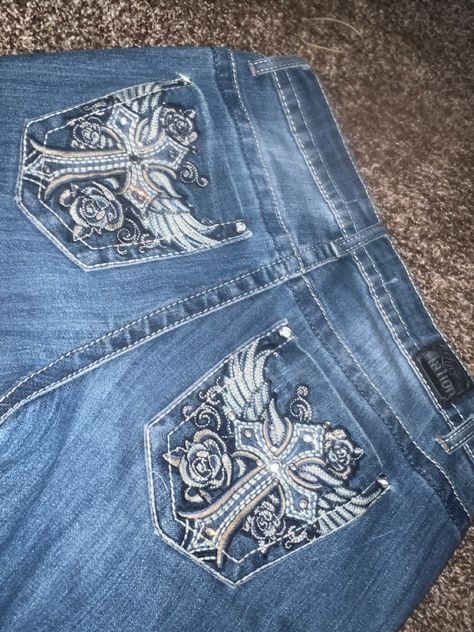 Y2k Jeans With Gems, Flare Jeans With Pocket Design, Angel Jeans Y2k, Jeans With Bedazzled Pockets, 2000s Bedazzled Jeans, Y2k Jeans Back Pocket, Bejeweled Jeans Y2k, Cross Jeans Y2k, Rhinestone Pocket Jeans