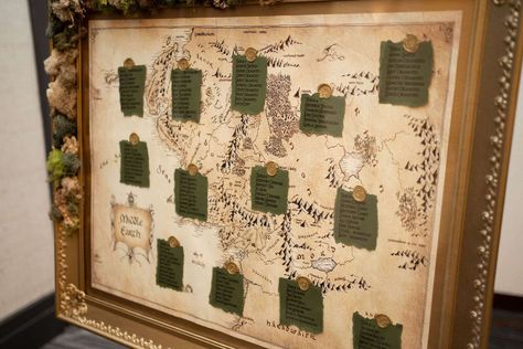 Green & Gold Lord of the Rings Renaissance Festival Wedding · Rock n Roll Bride Lord Of The Rings Seating Chart, Lotr Wedding Decor, Lord Of The Rings Table Decorations, Lord Of The Rings Wedding Decor, Lord Of The Rings Wedding Theme, Lotr Wedding Ideas, Medieval Wedding Decorations, Rivendell Aesthetic, Weddings Vibes