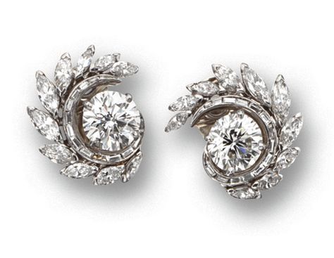 PAIR OF DIAMOND EARCLIPS, CIRCA 1950. Centering 2 round diamonds weighing 3.26 and 3.37 carats respectively, bordered by foliate swirls set with 20 marquise-shaped diamonds weighing approximately 5.70 carats and 26 baguette diamonds weighing approximately .50 carat, mounted in platinum Solitaire Jackets Earrings, Diamond Earring Jackets, The Bling Ring, Diamond Earrings Design, Solitaire Earrings, Platinum Jewelry, Baguette Diamonds, Antique Jewellery, Ear Studs