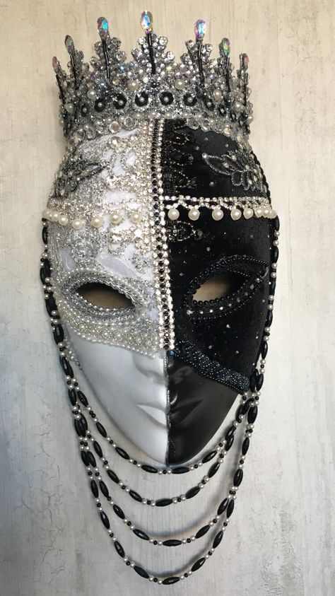 Unique full face mask, handcrafted in dramatic black and white. Embossed silver/white brocade and black velvet fabric embellished with diamantes, pearls, braid, crystals and jet beads. Stunning wall decoration for your home or studio or perfect as a unique statement piece for that masquerade ball or party.  Each Tiaura Arts piece comes with signed and dated certification detailing its unique title and catalogue number.  To see the full range of my work, I invite you to visit my website: www.tiau Masquerade Mask Full Face, Masquarade Mask, Venice Mask, Unique Masks, Black Velvet Fabric, Ball Mask, Masked Ball, White Face Mask, Venetian Masks