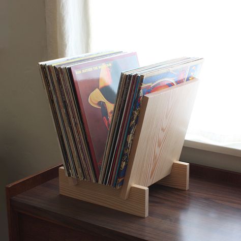 Simple And Classy Ways To Store Your Vinyl Record Collection Diy Record Holder, Diy Record Storage, Lp Record Stand, Vinyl Record Storage Diy, Diy Record, Vinyl Record Stand, Record Rack, Vinyl Record Holder, Vinyl Record Display