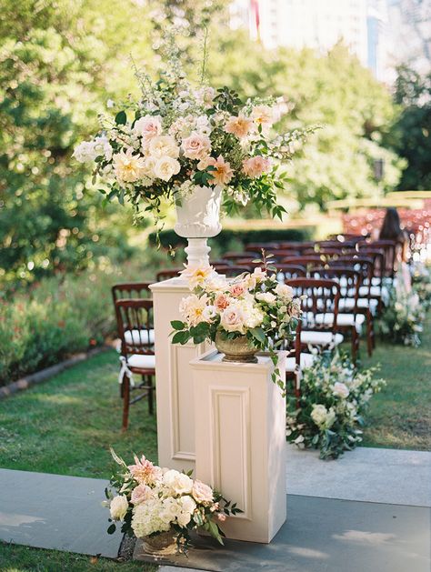 Flower Pedestals Wedding Aisle, Florals On Columns, Wedding Ceremony Floral Urns, Flower Pots For Wedding Ceremony, Top Wedding Flowers, Ceremony Urn Arrangements, Flowers On Columns Wedding, Floral Risers Wedding, Wedding Ceremony Podium Flowers