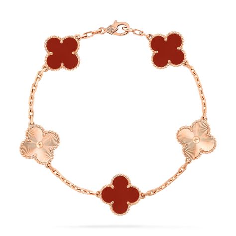 Faithful to the very first Alhambra® jewel created in 1968, the Vintage Alhambra creations by Van Cleef & Arpels are distinguished by their unique, timeless elegance. Inspired by the clover leaf, these icons of luck are adorned with a border of golden beads. Vintage Alhambra bracelet, 5 motifs, guilloché 18K rose gold, carnelian. Alhambra Van Cleef, Van Cleef Alhambra, Vintage Alhambra Bracelet, Alhambra Bracelet, Gold Vans, Van Cleef And Arpels Jewelry, Van Cleef & Arpels, Carnelian Bracelet, Daughter Jewelry