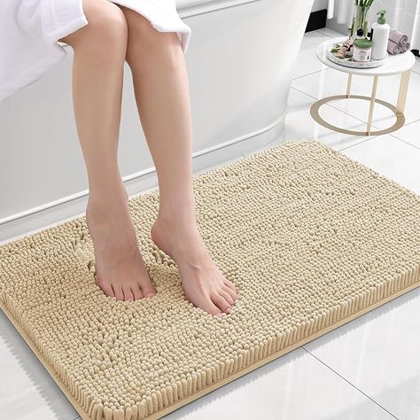 Indulge in comfort with our beige bath rug. Crafted for luxury, its soft, absorbent fabric pampers your feet, while the neutral hue complements any decor. With a non-slip backing for safety and easy-care machine washability, it’s the perfect blend of elegance and practicality. Add this cozy touch to your bathroom today! Luxury Bathroom Rug, Floor Tub, Rich Decor, Toilet Rug, Bathroom Bath Mats, Tub And Shower, Bathroom Rug Sets, Shower Mat, Bath Rugs Sets