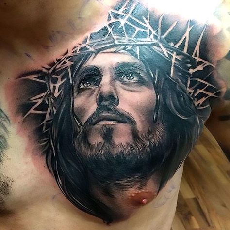 A tattoo of the face of Jesus. It's done very well in black and gray style. Style: Black and Gray. Color: Black. Tags: Beautiful Jesus Chest Tattoo, Christus Tattoo, Jesus Christ Tattoo, Jesus Tattoo Design, Tato Salib, Christ Tattoo, Free Tattoo Designs, Tattoo Trend, Black Jesus