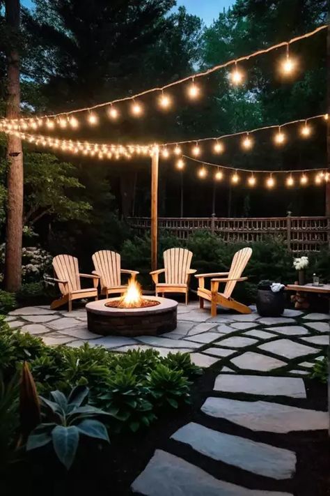 Backyard fire pit area with flagstone pathway and Adirondack chairs Outdoor Swing And Fire Pit, Gazebo And Fire Pit Ideas, Best Fire Pit Ideas, Fire Pit Ideas Backyard With Pavers, Firepit String Lights, Shed And Fire Pit Area, Permanent Fire Pit, Natural Fire Pit Ideas Backyard, Outdoor Fire Pit Area Diy