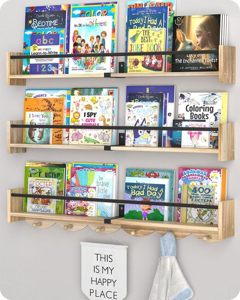 PRICES MAY VARY. Elegant Appearance : This book shelf for wall with a lively wavy shape and hook combination is the latest appearance design of our professional team. It not only has an elegant appearance, but also increases the use function of the kids bookshelf, which kids will like very much. (Patent protection has been applied for) Large Storage Space : This is a nursery shelf with large storage space made of unpainted pine wood and metal, the size is 32x5x4 inches. Can hold more kids books, Book Shelf Ideas Bedroom Wall, Cute Book Storage Ideas, Book Shelves For Kids Room, Nursery Bookshelf Wall, Bookshelf For Kids Room, Kids Book Storage Wall, Children’s Book Storage, Kids Bedroom Shelving Ideas, Kids Book Shelf Ideas