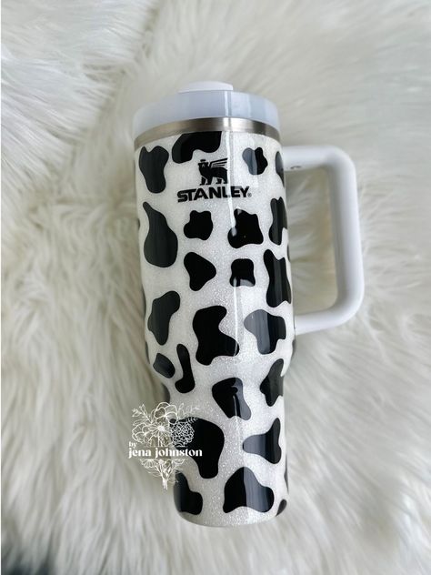 Cow Print 40oz Stanley in photos Tumbler is new & has never been used. CAUTION - Epoxy coating is more fragile in extreme temperatures - do NOT leave cup in car during hot/cold days or sitting in the sun. Do not freeze. Do not soak or use in dishwasher. Hand wash only. Please note due to this item being homemade there may be some cosmetic imperfections. However I have been doing this for years and keep them to a minimum. If you have any questions or concerns on your purchase please contact me ri Stanley Cup Western, Stanley Cup Cow Print, Stanley 40 Oz, Cow Stanley Cup, Cute Cow Stuff, Cow Print Stanley Cup, Western Tumbler Ideas, Cow Cups, Cow Print Stuff