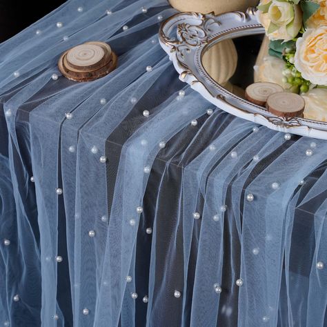 PRICES MAY VARY. Polyester, Nylon EXTRA LONG PEARL TABLE RUNNER: OSVINO pearl table runner is made of soft chiffon veil with smooth pearls, the fabric is soft and smooth, light like butterfly wings, durable and reusable; 10 Feet length is the best choice for wedding table decoration, arch decoration, bridal veil. ROMANTIC WEDDING DECORATIONS: Wideth 63"(160cm) x Length 120"(300cm), this size can be freely decorated on wedding party tables of all sizes, rustic tablecloths with gorgeous pearls dra Blue Chiffon Table Runner Wedding, Pearl Tulle Table Runner, Pearl Table Runner, Hanukkah Brunch, Pearl Party Decorations, Pearl Themed Party, Celestial Bride, Chiffon Veil, Romantic Wedding Veil