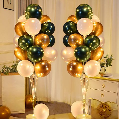 PRICES MAY VARY. Floor Balloon Stand Sets: You will receive 2 reusable balloon holder bases, 44 sticks, 26 balloon cups, 32 multi-color metal balloons (14 green, 10 gold, 8 white balloons), 2 light strings and 1 glue dot. Let beautiful balloons table decorations for party give you a wonderful party experience. Exquisite Design: The ingenious balloon can add surprise and romance to your gift, party balloons is made of natural latex, and the material is safe and reliable. Green, white and gold bal Green Gold And White Centerpieces, Emerald Party Decor, Green And Gold Centerpieces Simple, Green Gold Party Decorations, Emerald Party Decorations, House Party Decorations Birthday Adult, Emerald Green Balloon Garland, Green And Gold Party Decor, Green And Gold Decorations Party Ideas