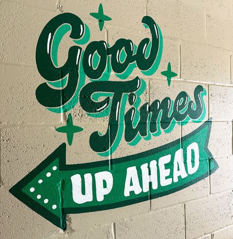 Art by Olga Muzician. Good times up ahead lettering mural This Must Be The Place Mural, Mural With Words, Welcome Mural, Mural Typography, Typography Mural, Window Lettering, Book Collage, Tour Group, Window Mural