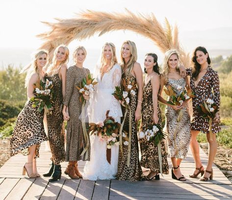 We love these leopard print bridesmaids dresses! #bridesmaids #leopardprint #bridesmaiddresses Cheetah Print Wedding, Leopard Print Wedding, Leopard Wedding, Printed Bridesmaid Dresses, Safari Wedding, Neutral Bridesmaid Dresses, Santa Barbara Wedding, Wild Heart, California Cool