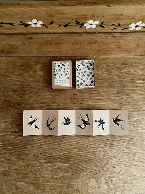 Matchbox art. Keepsake box. Concertina painting of Swallows. Flowers painting in black and white in a romantic folk art style on a wooden desk. Gypsy flowers. Painted Matchboxes, Match Box Craft, Art Miniature, Matchbox Art, Bookmaking, Swallows, Piece Of Art, Summer Solstice, Keepsake Box