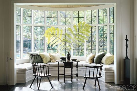 Designer Sunrooms - Screened Porches - ELLE DECOR Sunroom Decorating, Sunroom Designs, Bow Window, Lots Of Windows, Casement Windows, Kitchen Window, Room Decorations, A Living Room, Window Seat