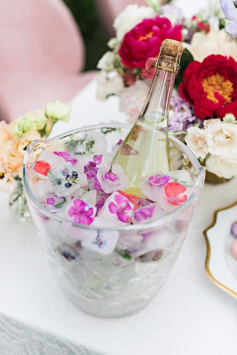 Champagne chilling in ice with small purple flowers Aesthetic Summer Picnic, Brunch Tea Party, Modern Tea Party, Flower Ice Cubes, Art Nouveau Wedding, Nouveau Wedding, Art Nouveau Weddings, English Tea Party, Flower Ice