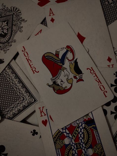 Playing Cards Dark Aesthetic, Dark Card Aesthetic, Joker Card Wallpaper Aesthetic, Joker Playing Card Wallpaper, Dark Cards Aesthetic, Joker Out Aesthetic, Vintage Playing Cards Aesthetic, Card Playing Aesthetic, Cards Wallpaper Aesthetic