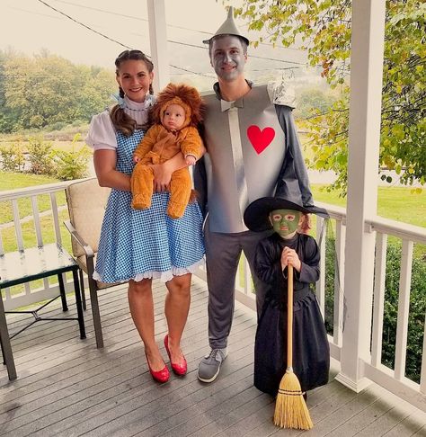 Family Costumes With Lion, Halloween Costume Family With Baby, Family Halloween Costumes With Witch, Family Halloween Costume Baby And Dog, Lion Halloween Costume Family, Family Halloween Costumes Witch, Baby Lion Costume Family, Mom Dad Toddler Halloween Costumes, Dorothy And Lion Costume